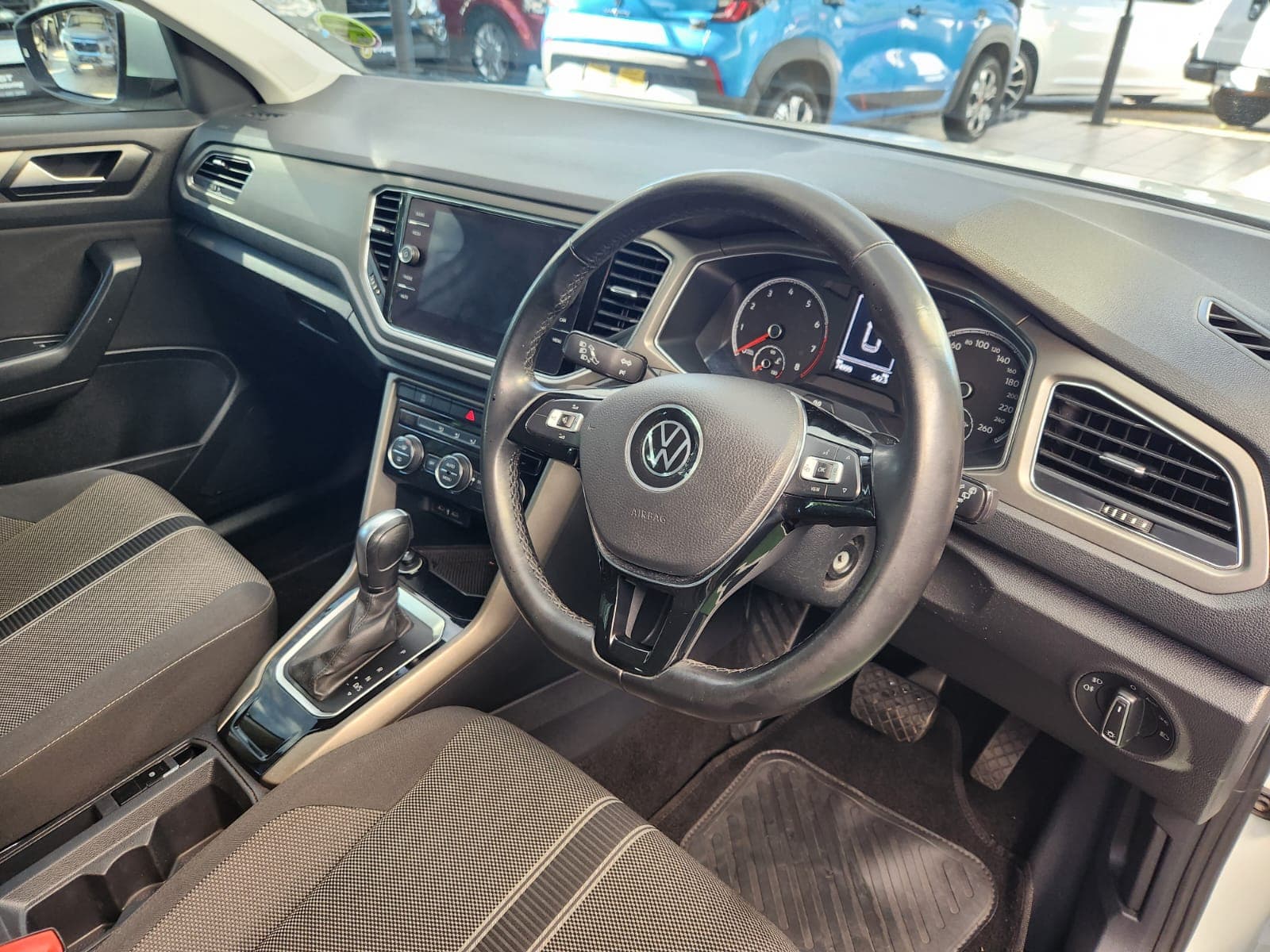 Engine bay of the 2021 Volkswagen T-Roc 1.4 TSI Design Auto, detailing the 1.4 TSI petrol engine.