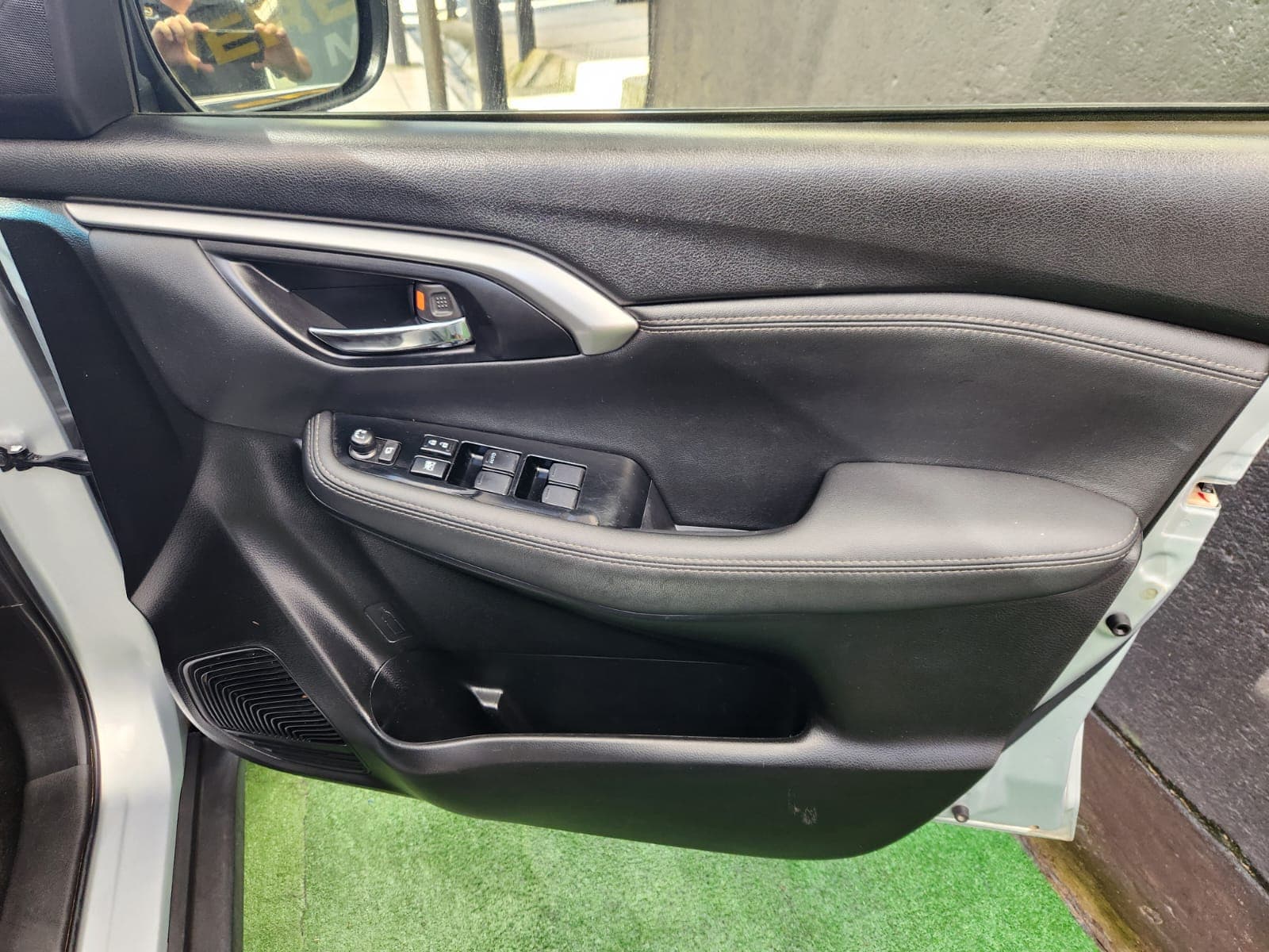Spacious boot area of the 2024 Suzuki Grand Vitara 1.5 GLX Auto, with the tailgate open.